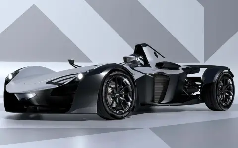Ein futuristischer BAC Mono Supersportwagen in Schwarz und Silber, bereit für die Rennstrecke.