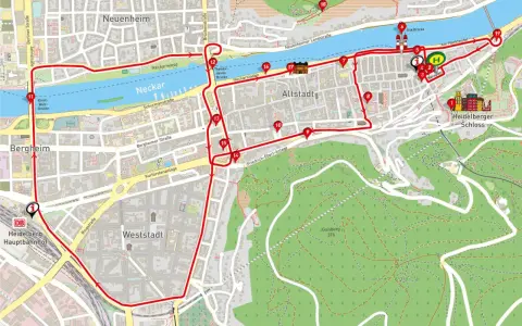 Karte mit einer roten Route, die Sehenswürdigkeiten in Heidelberg verbindet, vom Hauptbahnhof über den Neckar und das Schloss.