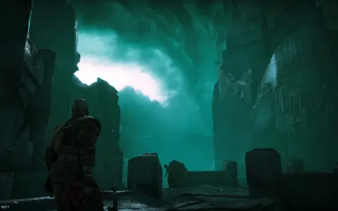 Kratos se adentra en Helheim, el reino de los muertos de God of War, bajo un cielo verde espectral.