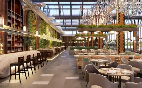 Interior de bar moderno con barra de mármol, estanterías de vino, vegetación y lámparas de araña. Ideal para la licencia apertura bar.