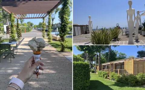 Lody na patyku i plażowe rzeźby na Marina di Venezia Camping. W tle widać domki kempingowe i alejkę.