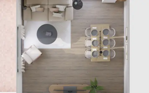 Vista aérea de un salón-comedor moderno. El salón tiene un sofá beige, mesa de centro redonda y sillón. El comedor, con mesa de madera y seis sillas, se ubica junto a la ventana. Las medidas del salón son ideales para este diseño.