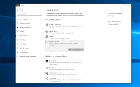 Schermata di risoluzione problemi di Windows 11, con opzioni per l'aggiornamento di Windows e altri problemi comuni.