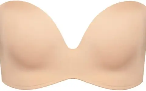 Reggiseno Wonderbra color carne, senza spalline, con scollatura profonda a V. Perfetto per abiti eleganti.