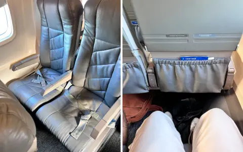Leather seats on a Contour Airlines flight. The image shows legroom and seat details, offering a glimpse into Contour Airlines reviews.