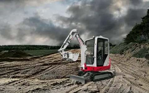 Mini koparka Takeuchi TB216 na budowie, gotowa do pracy. Sprawdź Takeuchi TB216 dane techniczne.
