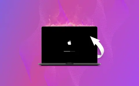 MacBook z jabłuszkiem i paskiem postępu, symbolizujący proces, jak zresetować Maca do ustawień fabrycznych.