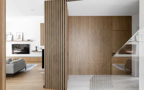 Interno di una casa stile nordico moderno, con pareti in legno, divisori a listelli e arredi minimalisti.