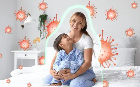Mama tuli dziecko, które kaszle tylko w nocy. Wokół nich wirusy, ale chroni je zielona bariera.