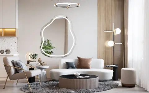 Nowoczesny salon z fotelem, sofą i stolikami. Lustro o nieregularnym kształcie przypomina cloud dancer.