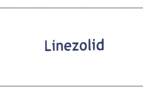 Niebieski napis "Linezolid" na białym tle. Linezolid to antybiotyk.