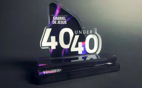 A "40 Under 40" award for Gabriel De Jesus, showcasing how strong is acrylic. The award features a sleek, modern design with vibrant purple and pink accents.