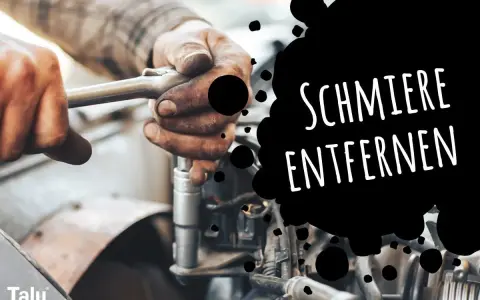 Hände mit Fettflecken reparieren ein Auto. Tipps, wie man Schmierfett aus Kleidung entfernen kann.