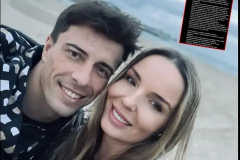 Robert Karaś i jego żona na zdjęciu. Uśmiechnięci, patrzą w obiektyw.