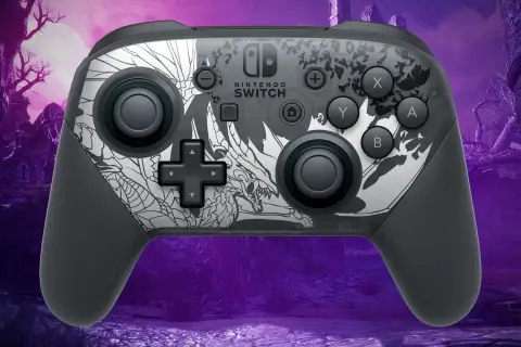 Szary pad Nintendo Switch z motywem smoka. Dowiedz się, jak podłączyć pada Nintendo do PC, by cieszyć się grami na większym ekranie.