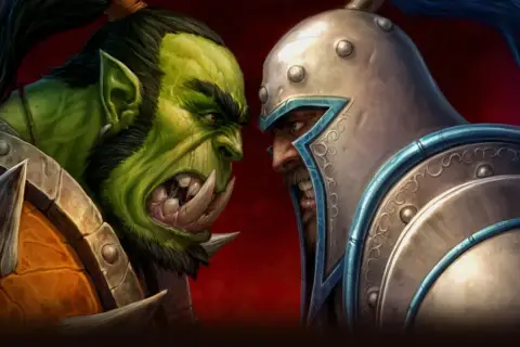 Zacięta konfrontacja orka i człowieka, ikoniczna dla Warcraft: Orcs & Humans.