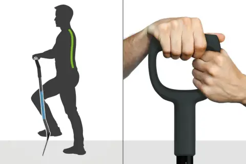 Ergonomiczna szufla z uchwytem, który zapewnia prawidłową postawę podczas pracy. Dwie dłonie pewnie chwytają rękojeść.