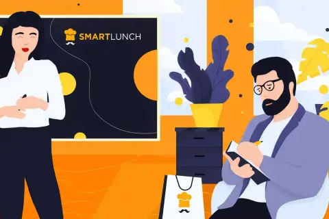 Kobieta prowadzi instruktaż, mężczyzna notuje. Na tablicy logo SMARTLUNCH.