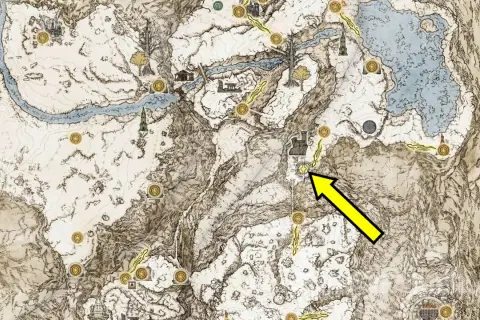 Mapa Elden Ring: Popioły Wojny. Żółta strzałka wskazuje drogę do lokacji w śnieżnych górach.