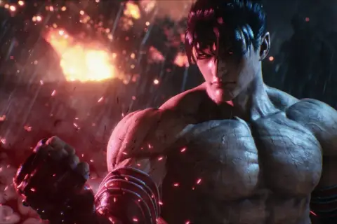 Jin Kazama pronto a combattere in Tekken 8 recensione. Sfondo infuocato e pioggia di scintille.