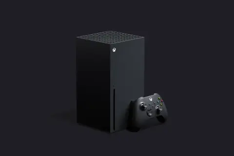Czarna konsola Xbox Series X i kontroler na ciemnym tle. Premiera nowej generacji gier.