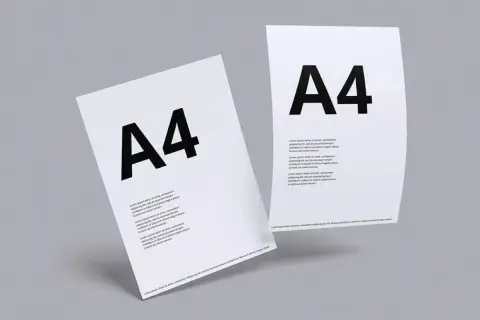 Dwie białe kartki A4 z dużym czarnym napisem "A4" i tekstem.