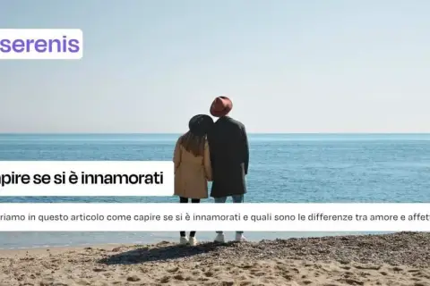 Coppia sulla spiaggia guarda il mare. L'articolo esplora la sindrome dell'innamoramento facile e le differenze tra amore e affetto.