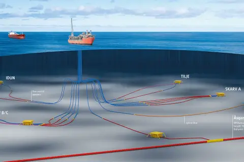 Ilustracja przedstawia podwodne systemy wydobywcze z rurociągami i jednostką FPSO na powierzchni.