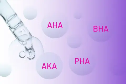 Kropla serum z kwasami AHA, BHA, AKA i PHA spływa z pipety.