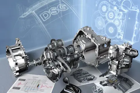 Rozłożony na części mechanizm skrzyni biegów DSG DQ200, z widocznymi trybami, wałkami i schematami technicznymi.