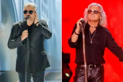 Dwóch rockmanów na scenie. Jeden śpiewa "Perfect nie płacz Ewka tekst", drugi z długimi włosami i w skórzanych spodniach.