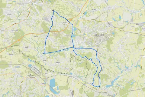 Mapa z zaznaczoną trasą rowerową wokół Wodzisławia Śląskiego, prowadzącą przez okoliczne miejscowości i tereny zielone.