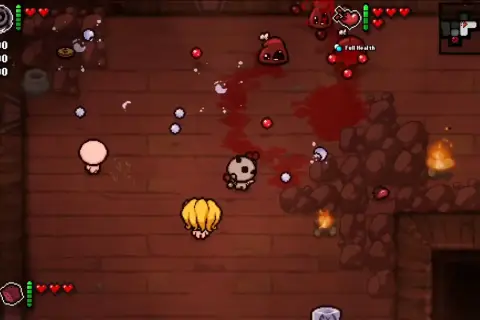 Dwie postacie w grze The Binding of Isaac walczą z potworami. Tryb co-op pozwala na wspólną zabawę.