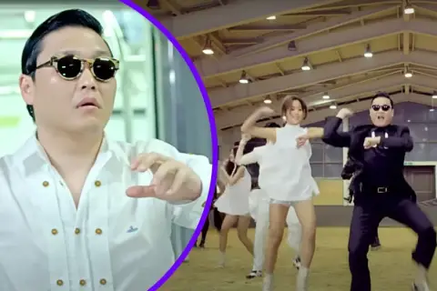 Psy w białej koszuli i w czarnym garniturze, tańczący w rytm "Gangnam Style". Tekst po polsku tego hitu zna każdy!