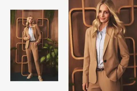 Elegancka stylizacja: jakie spodnie do beżowej marynarki? Modelka prezentuje komplet w odcieniu camel, idealny na co dzień i do pracy.