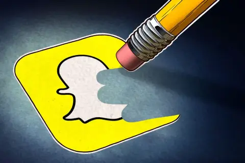 Ołówek z gumką wymazuje logo Snapchata, symbolizując, jak usunąć konto na Snapie.