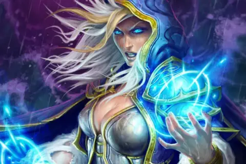 Jaina Proudmoore, czarodziejka z niebieskimi oczami, rzuca zaklęcie. Jej moc jest równie potężna jak siła primaris space marines.