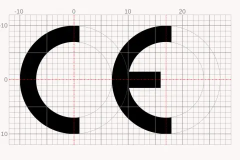 Symbol CE, oznaczający certyfikat zgodności produktu, narysowany na siatce z pomocniczymi liniami.