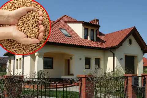 Czym ogrzewać stary dom? Oto rozwiązanie: pellet drzewny w dłoniach i nowoczesny dom z czerwonym dachem.