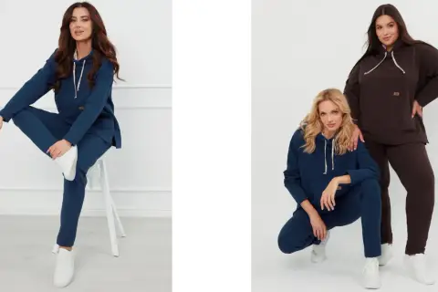 Dwie kobiety w dresach. Jedna w granatowej bluzie basic czarnej, druga w brązowej.