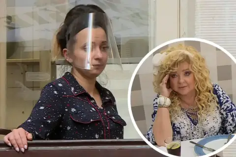 Kobieta w przyłbicy w restauracji, obok Magda Gessler z kolorowymi patelniami w tle.