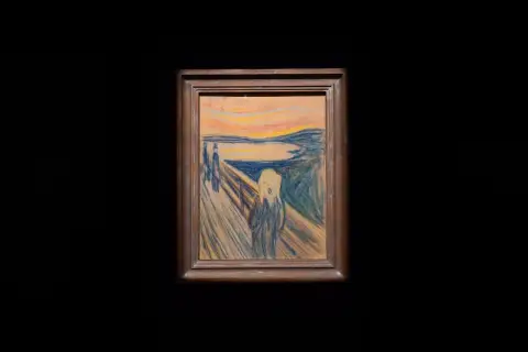 Edvard Munch najsłynniejsze obrazy: przerażona postać na moście krzyczy na tle krwawego nieba.