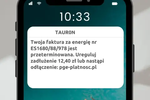 Ostrzeżenie przed smishingiem: fałszywa wiadomość od TAURON informuje o zaległej fakturze i grozi odłączeniem prądu, kierując na podejrzaną stronę.