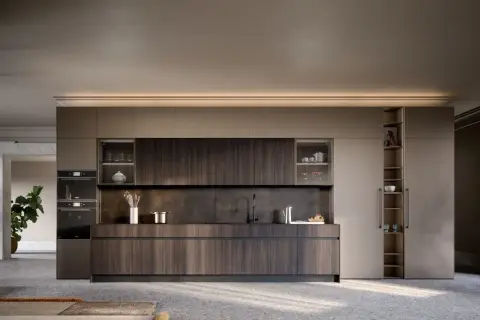 Cucina moderna con finiture in legno scuro e pensili a scomparsa. Un esempio di come abbellire una cucina moderna con stile e funzionalità.