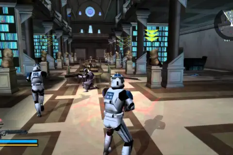 Żołnierze galaktyczni w grze Battlefront 2 PS5 walczą w bibliotece pełnej posągów i książek.