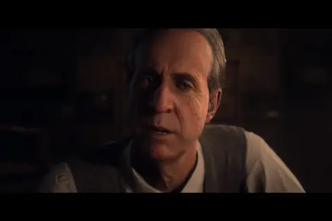 Starszy mężczyzna z siwiejącymi włosami i zmarszczkami na twarzy, w kamizelce i koszuli. Wygląda na zaniepokojonego. Scena z Until Dawn remake.