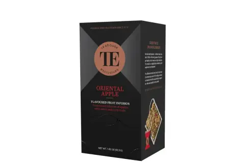 Pudełko herbaty **oriental apple** z napisem "Teahouse Exclusives". Tradycyjny napar owocowy o słodkim smaku.