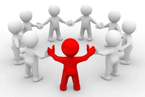 A red figure stands in the center of a circle of white figures, arms outstretched. This symbolizes leadership, like a board chair job description.