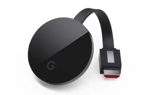 Czarny Chromecast z logo Google. Dowiedz się, jak połączyć się z chromecast, aby strumieniować treści.
