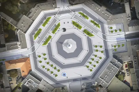 Nowoczesny plac wolności w Łodzi z zielonymi wyspami, szachownicą i torami tramwajowymi.